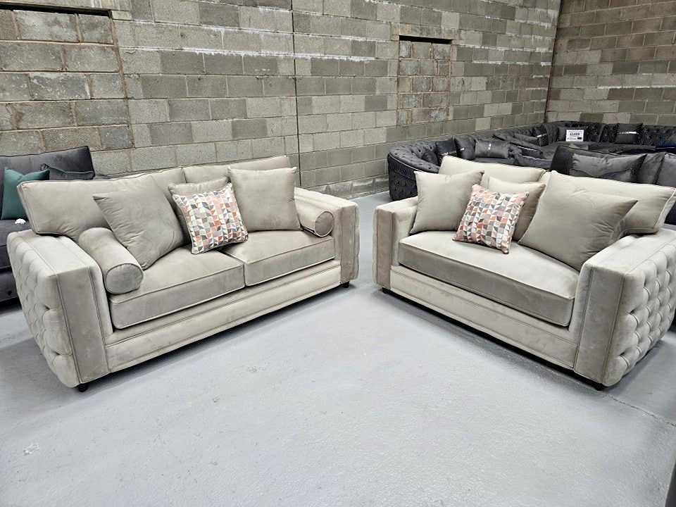 Beige velvet two seater and three seater sofa set with button-tufted arms